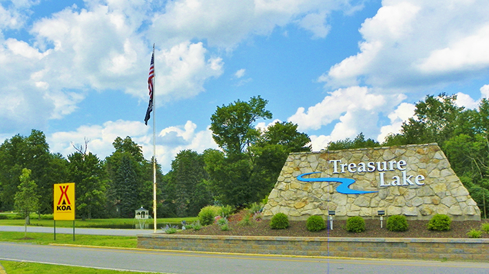 Treasure Lake Entrance View - A New Logo, A New Season
